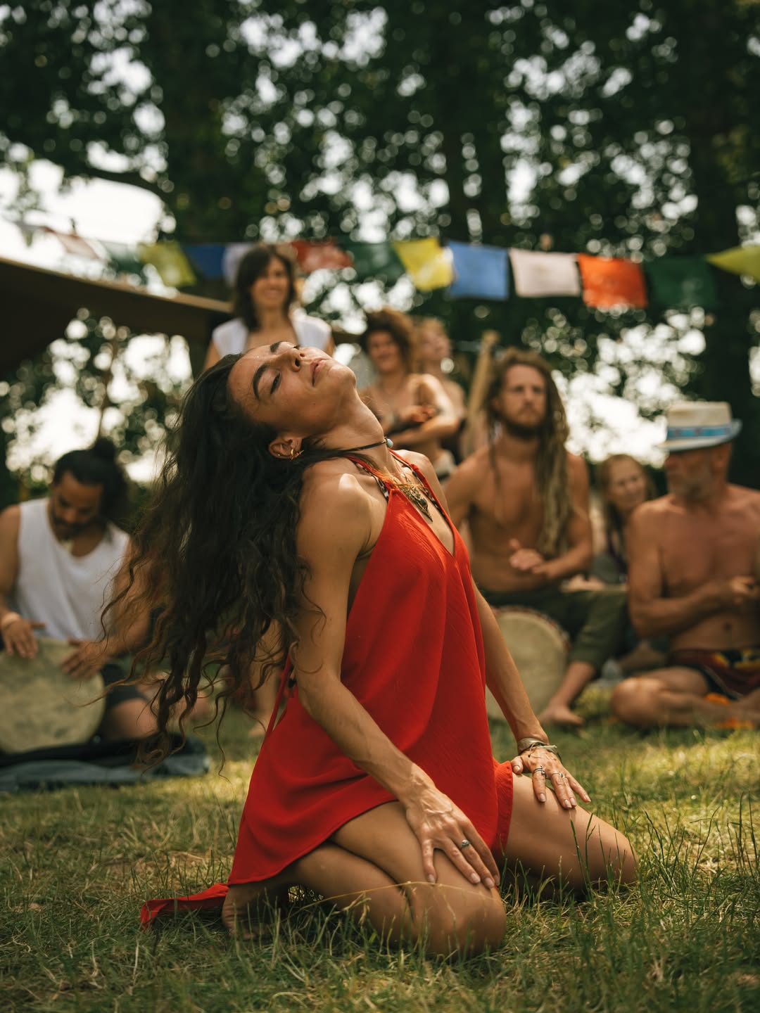 Dancer in red dress at Shamballa